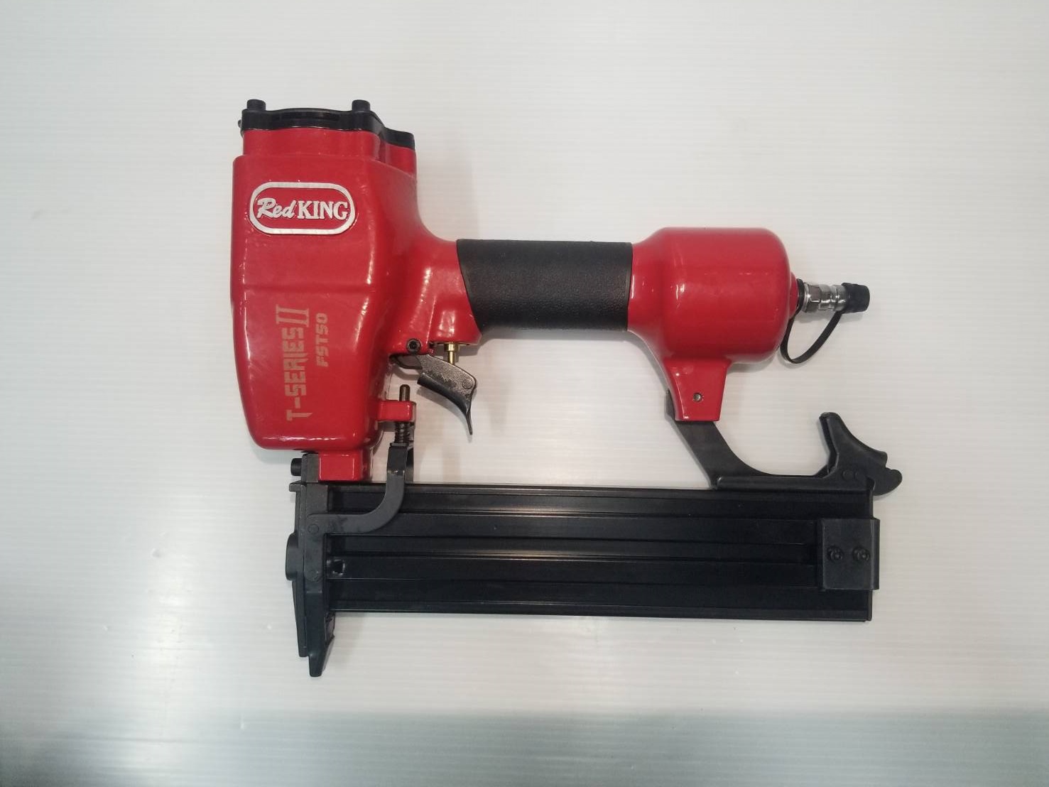 แม็กยิงตะปูลมคอนกรีต-ไม้ ขาเดี่ยว FST-50 REDKING (T SERIES) II