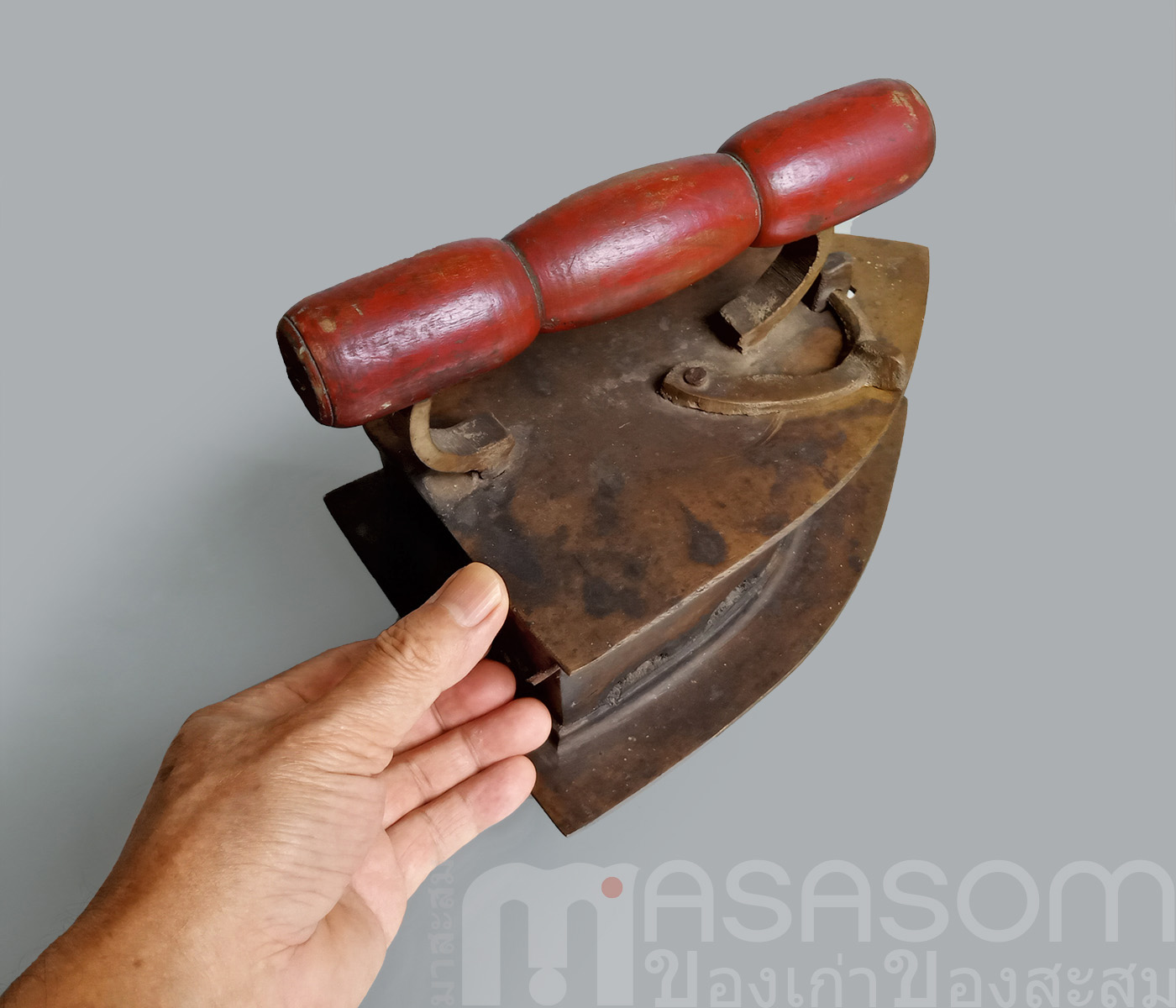 เตารีดผีเสื้อทองเหลืองโบราณ