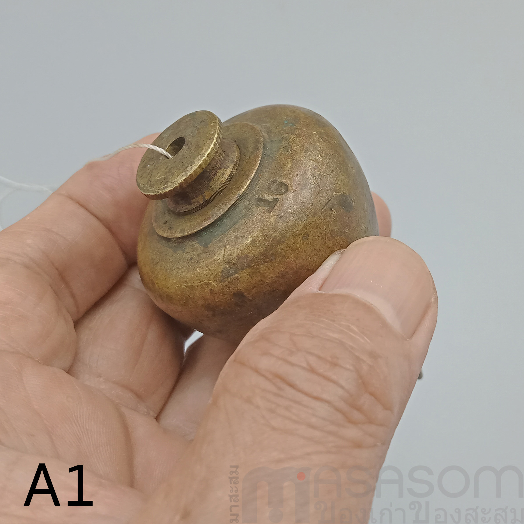 ลูกดิ่งทองเหลืองโบราณ