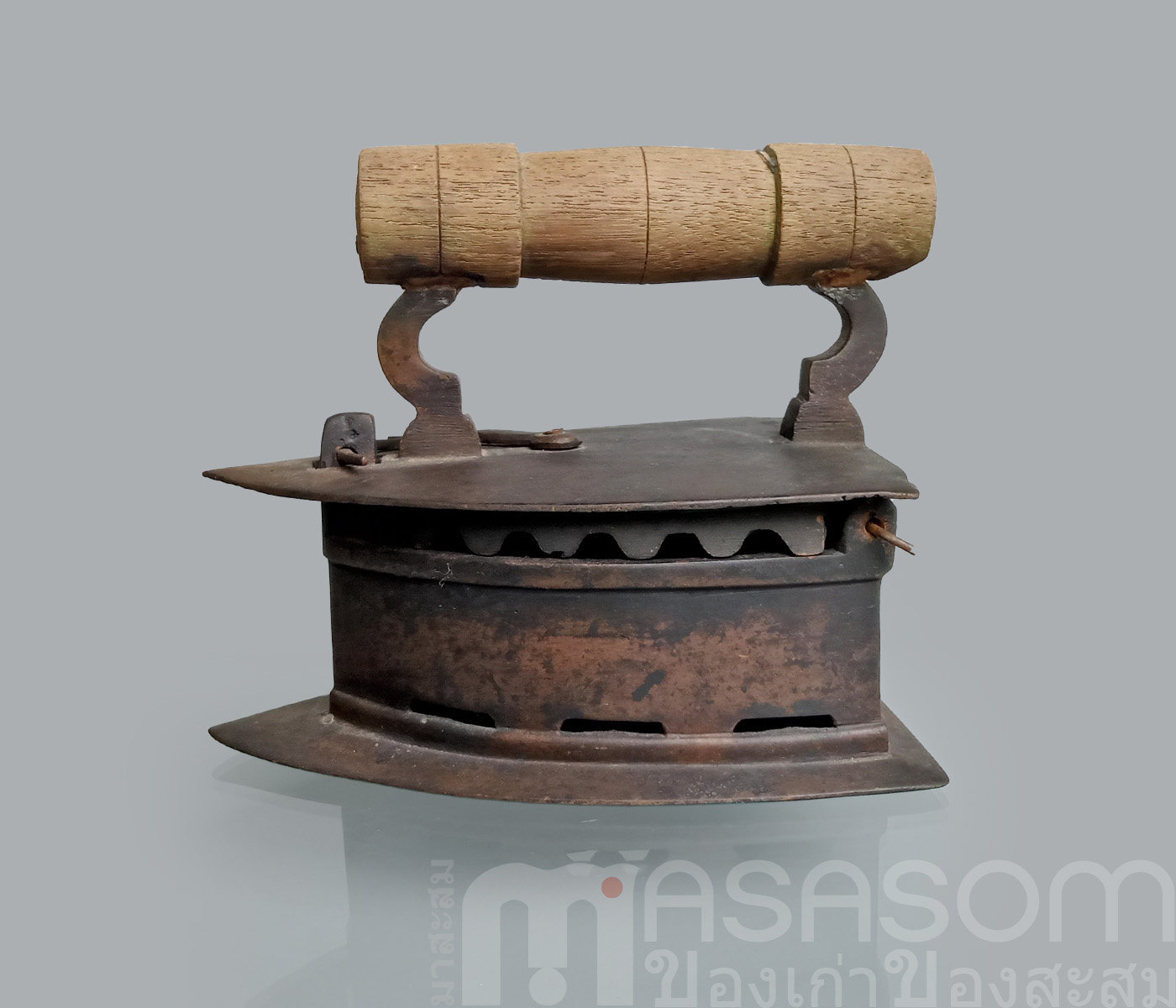 เตารีดผีเสื้อทองเหลืองโบราณ