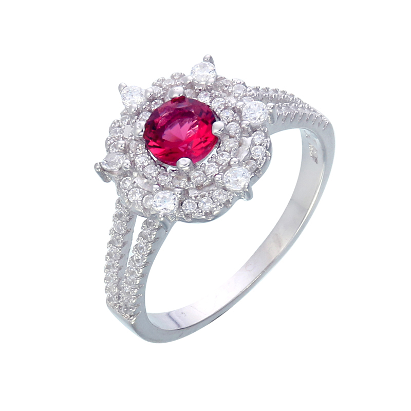 แหวนทองคำขาว ประดับเพชร CZ แหวนดอกไม้ประดับพลอยกลมเหลี่ยมเกสรสีแดง ล้อมเพชรกลมขาว ฉลุบ่าฝังเพชรเรียงเรียง 2 แถว ดีไซน์โฉบเฉี่ยวทันสมัยควรค่าแก่การครอบครอง ใส่ติดนิ้วได้ทุกงาน