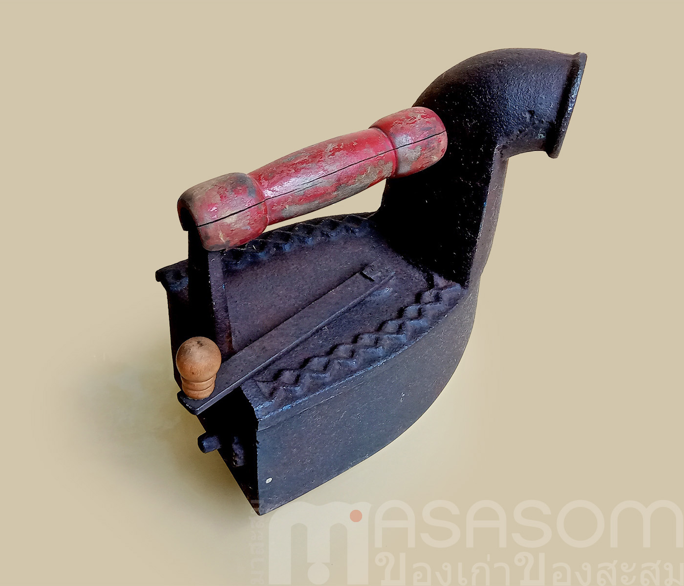 เตารีดงวงช้างโบราณ