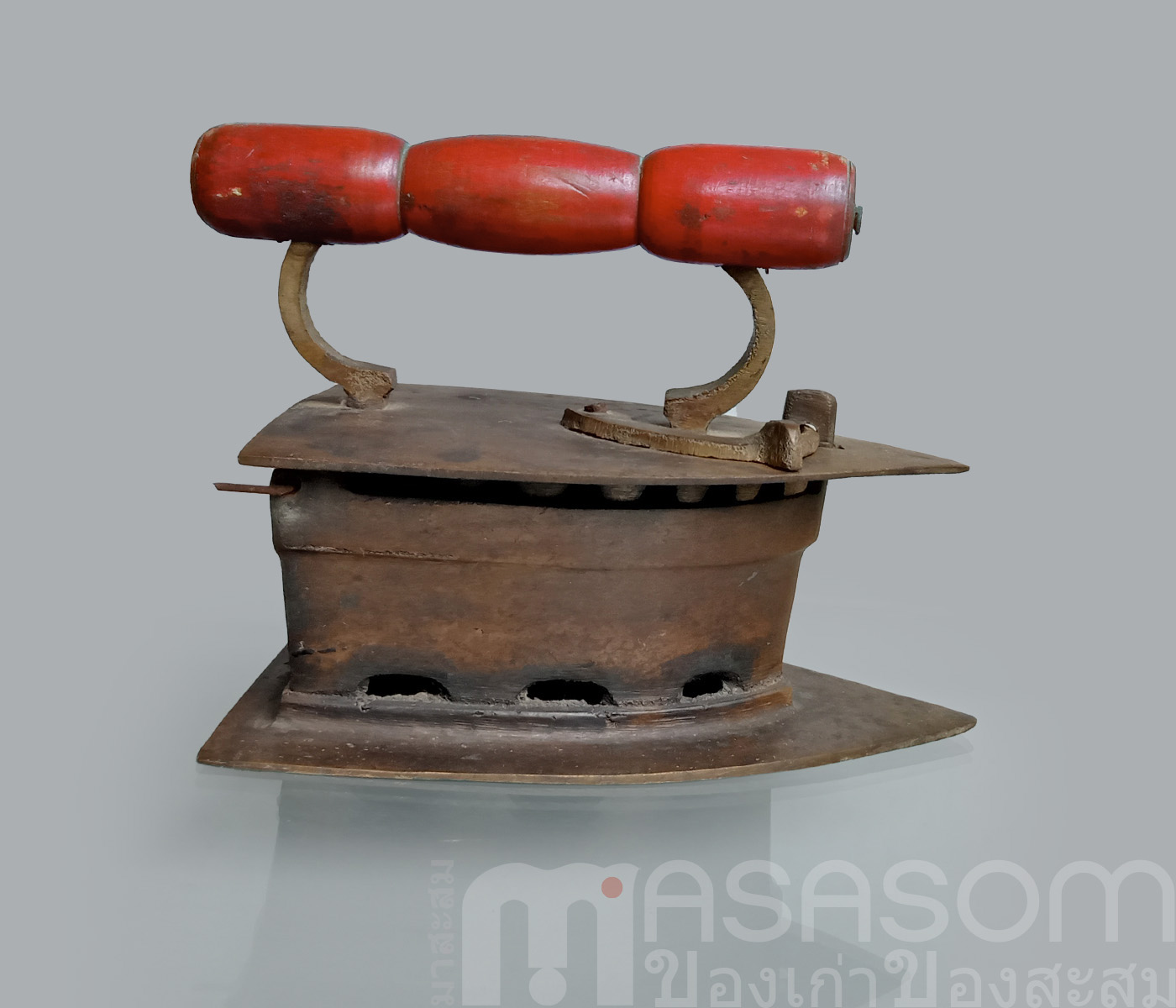 เตารีดผีเสื้อทองเหลืองโบราณ