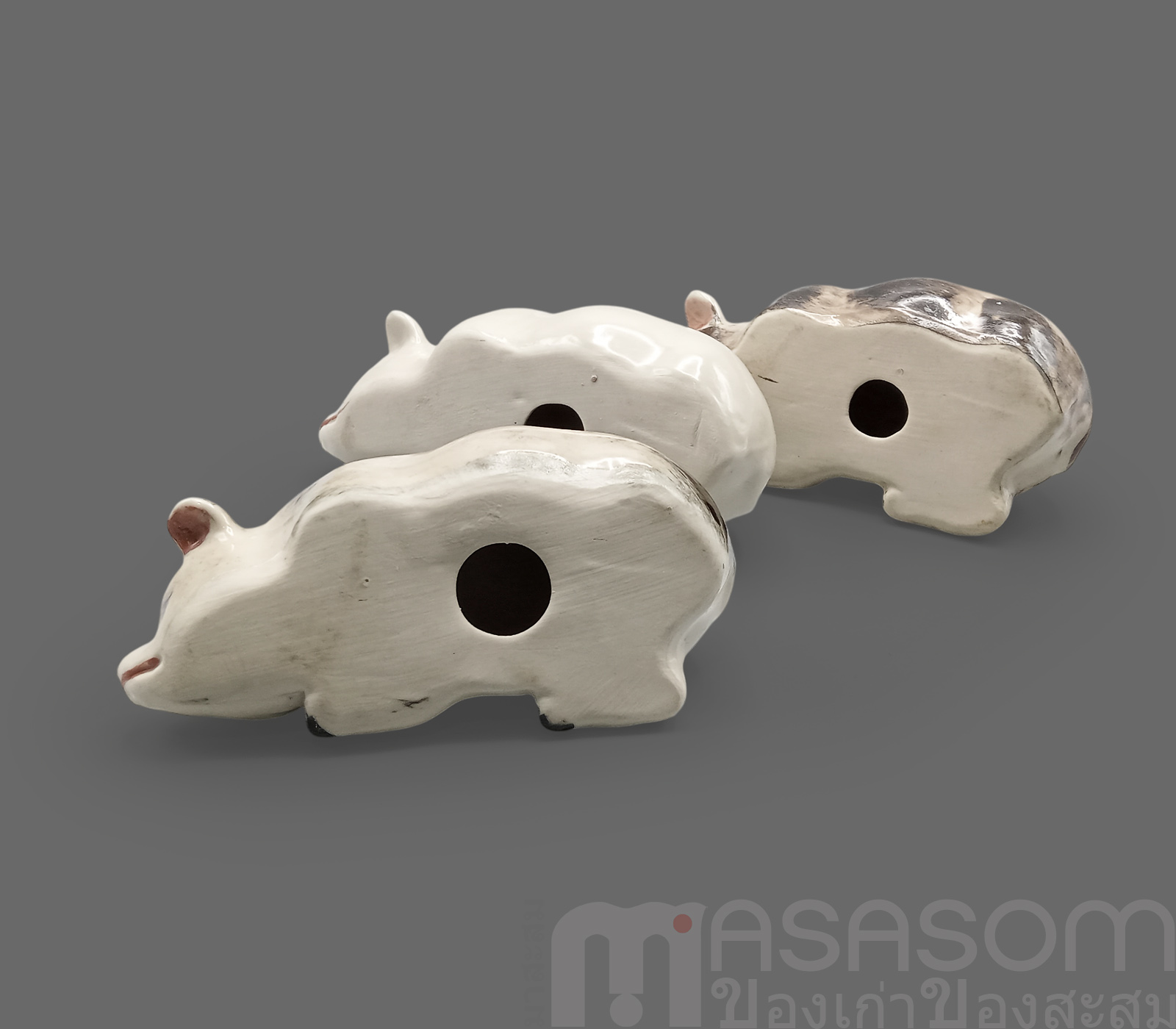 ตุ๊กตารูปหมูนอนเซรามิค