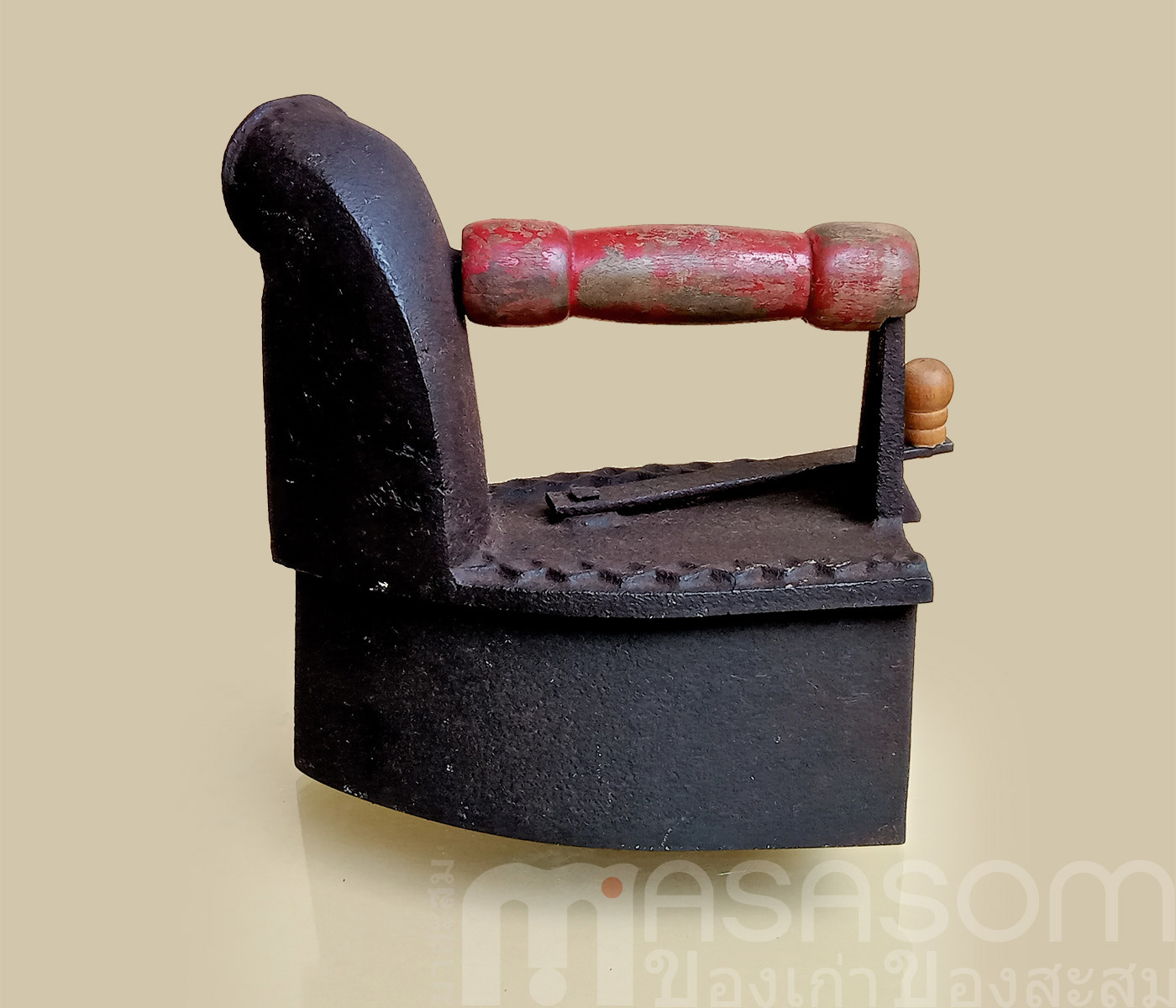 เตารีดงวงช้างโบราณ