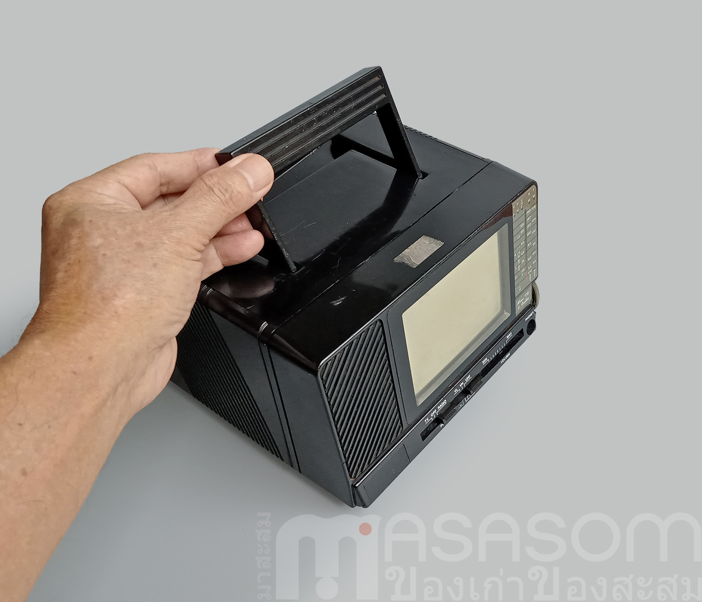 ทีวีวิทยุกระเป๋าหิ้วสีดำ