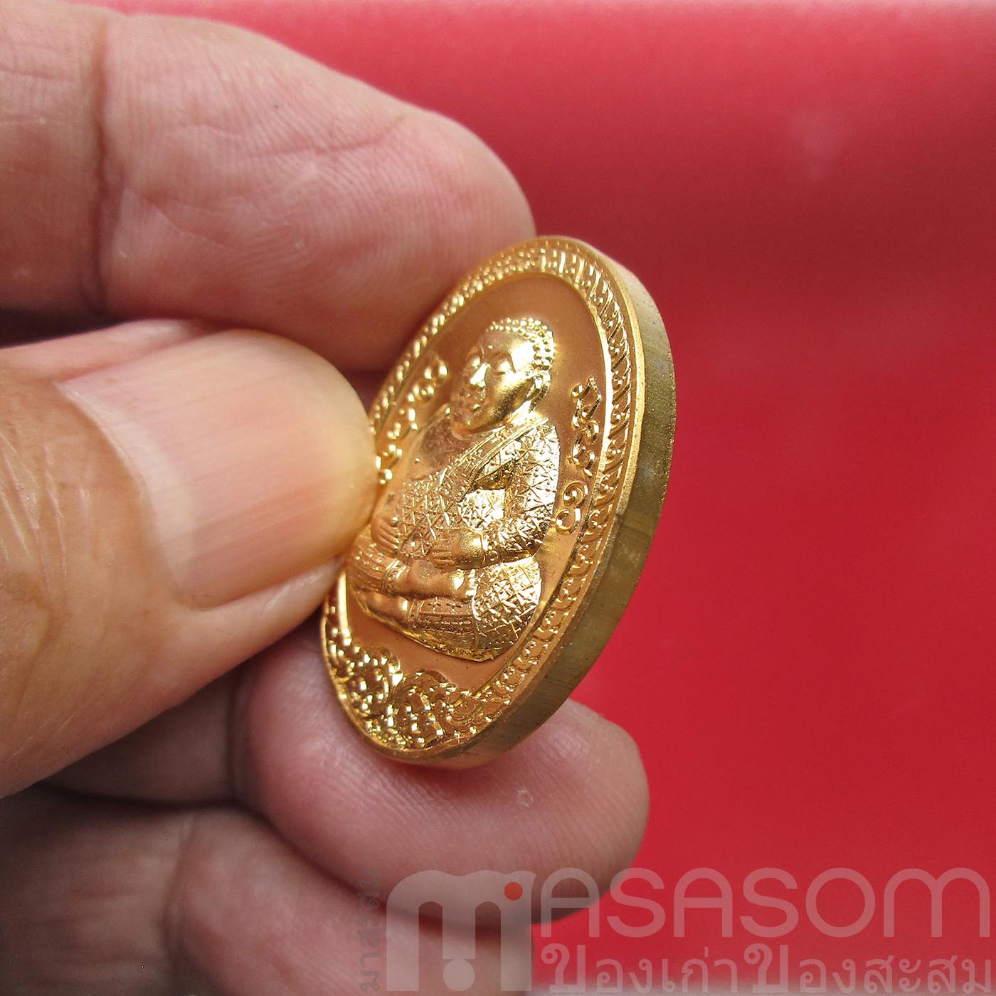 เหรียญพระสังกัจจายน์อุ้มทรัพย์