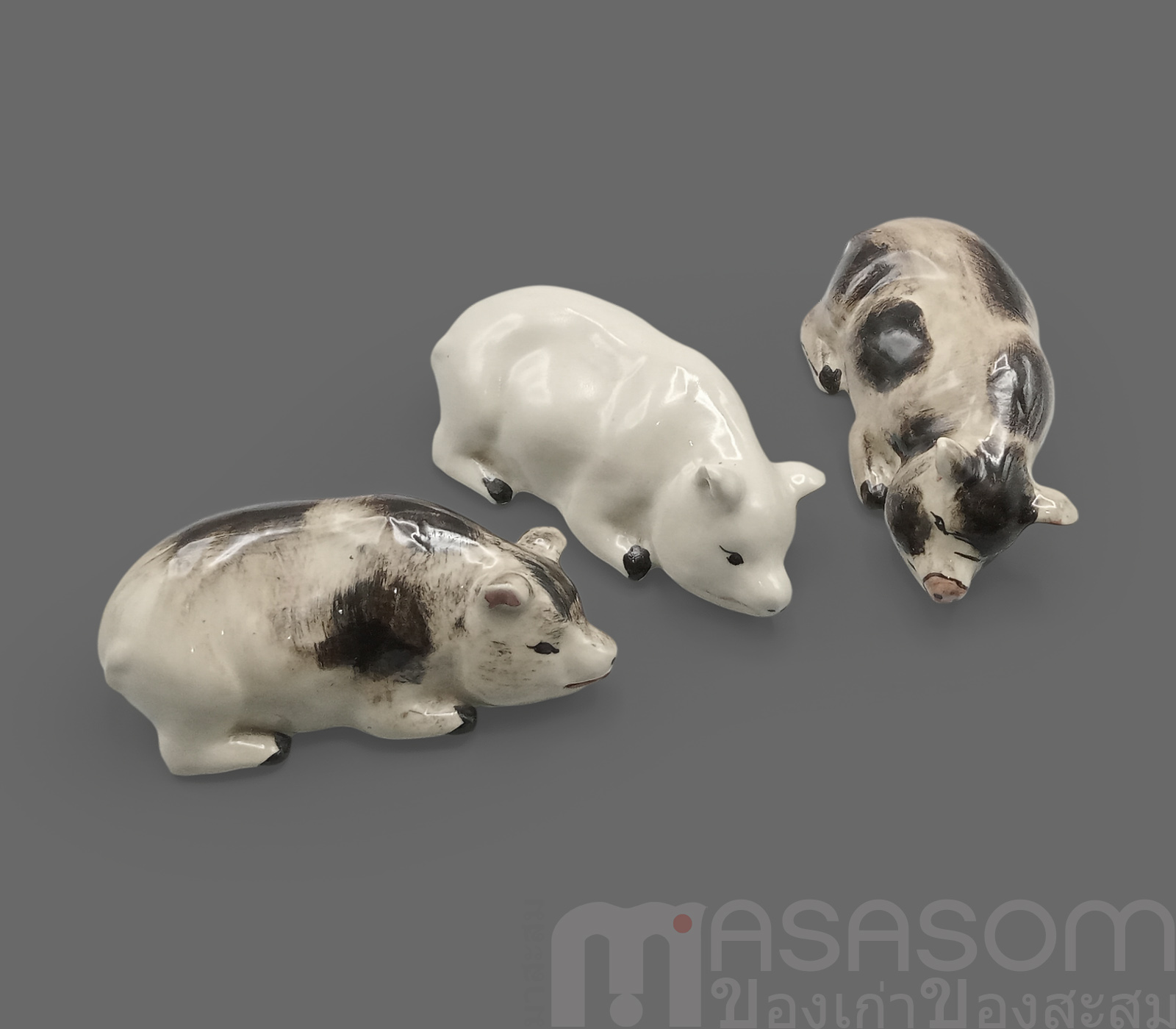 ตุ๊กตารูปหมูนอนเซรามิค