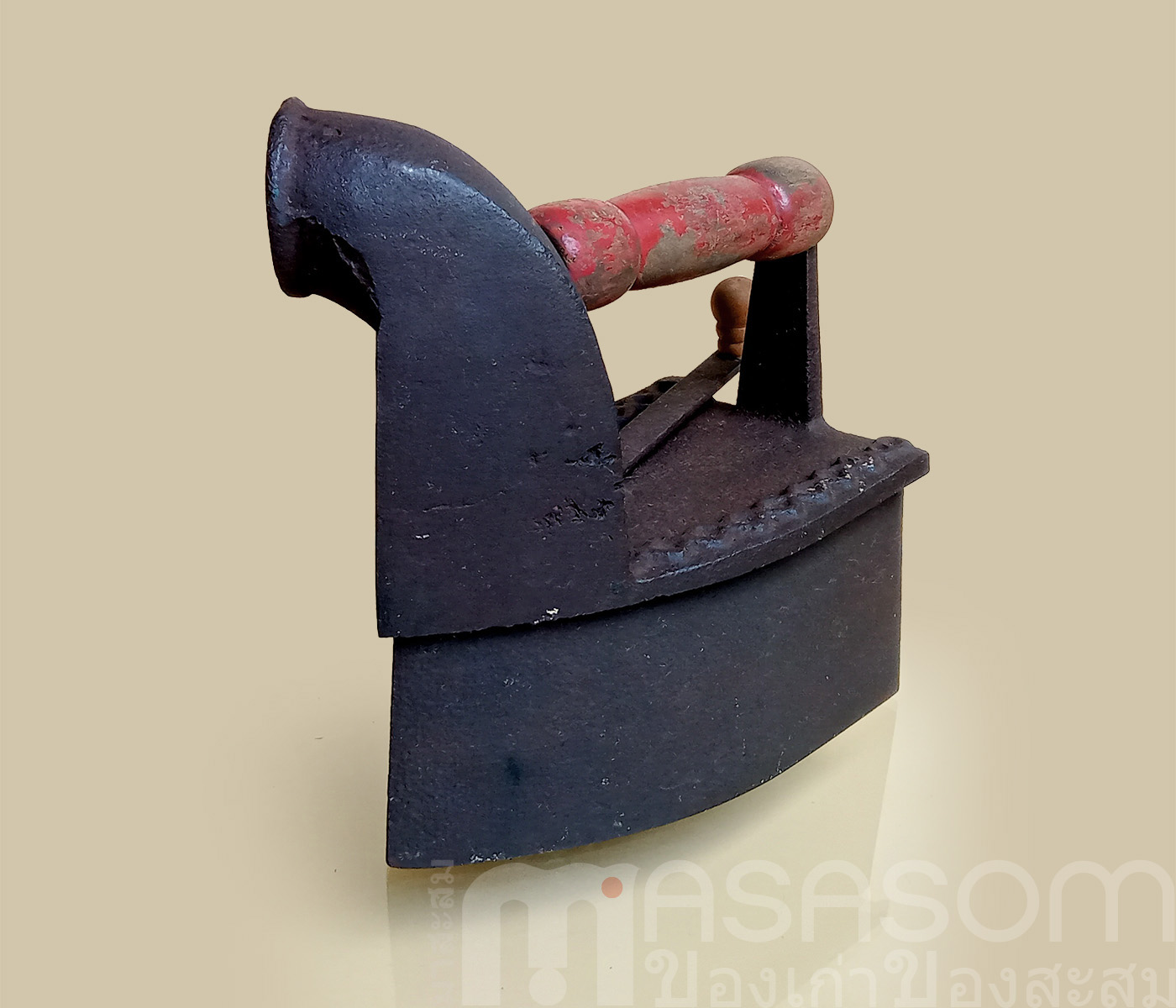 เตารีดงวงช้างโบราณ