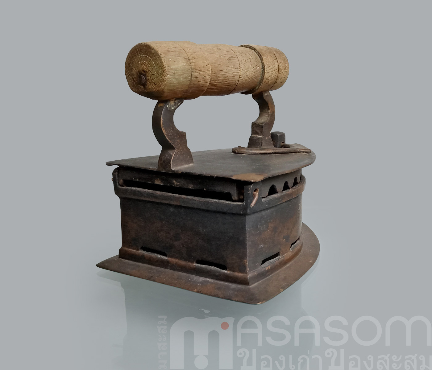 เตารีดผีเสื้อทองเหลืองโบราณ