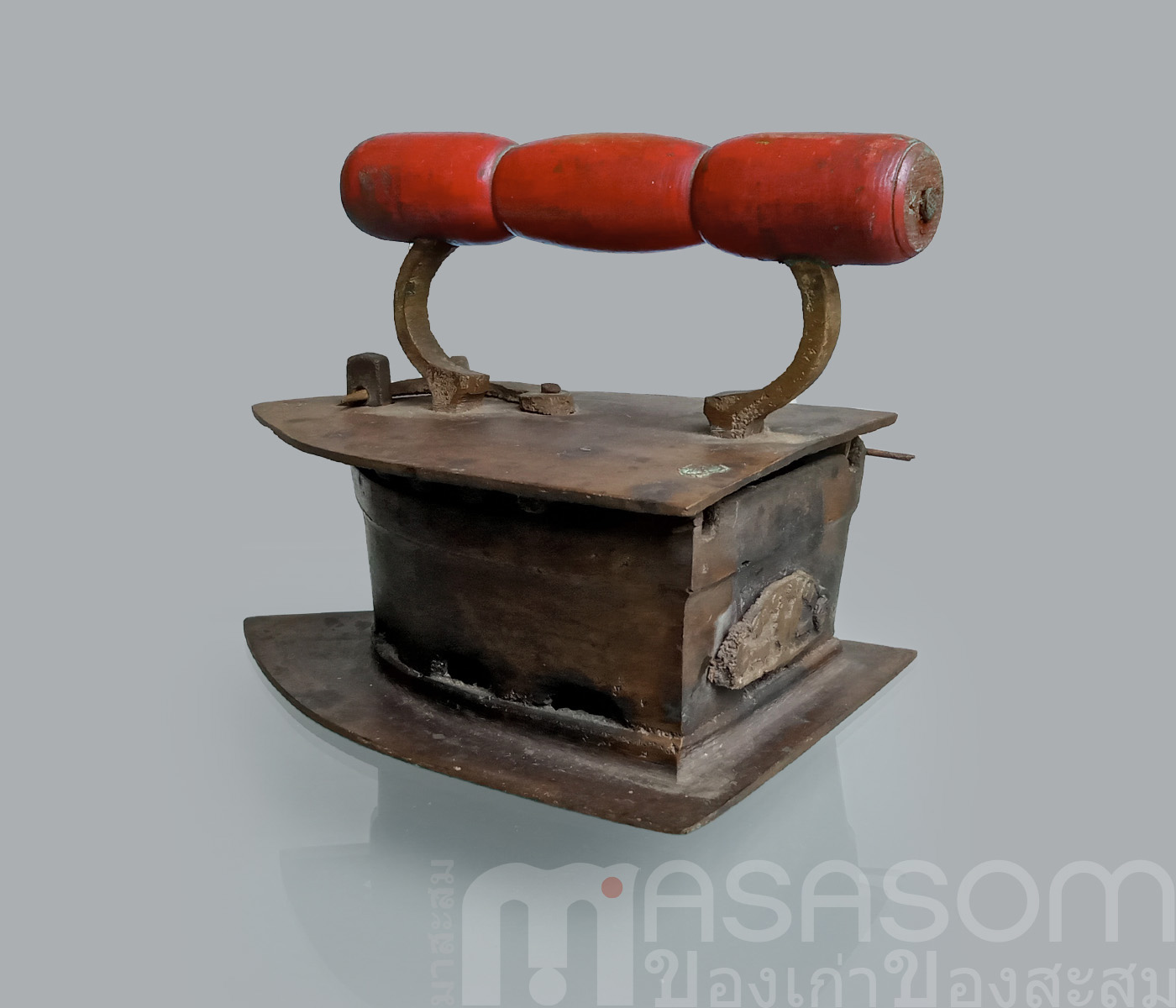 เตารีดผีเสื้อทองเหลืองโบราณ