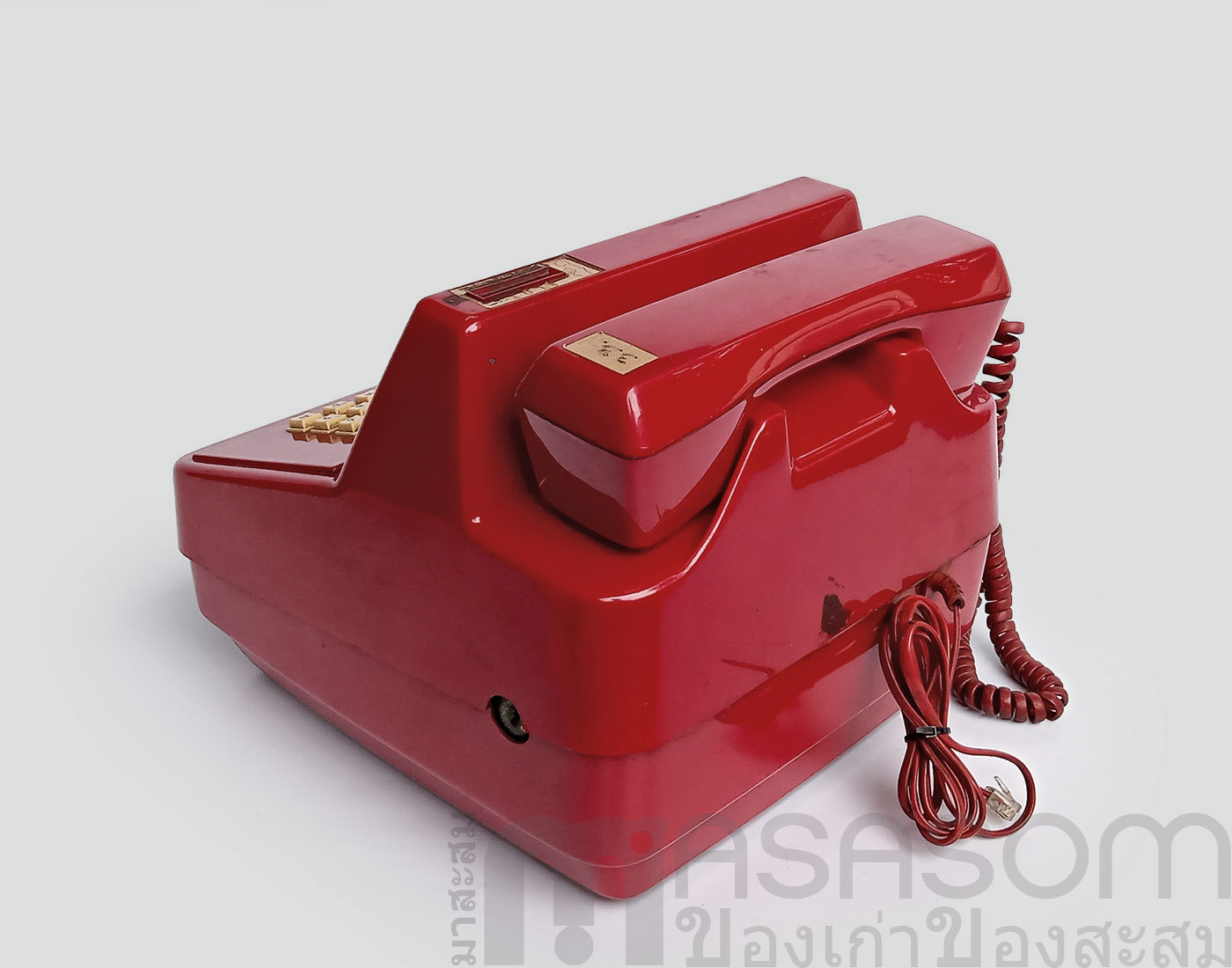 โทรศัพท์เก่าหยอดเหรียญสีแดง