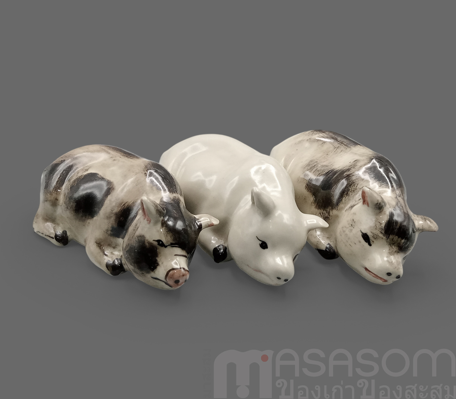 ตุ๊กตารูปหมูนอนเซรามิค