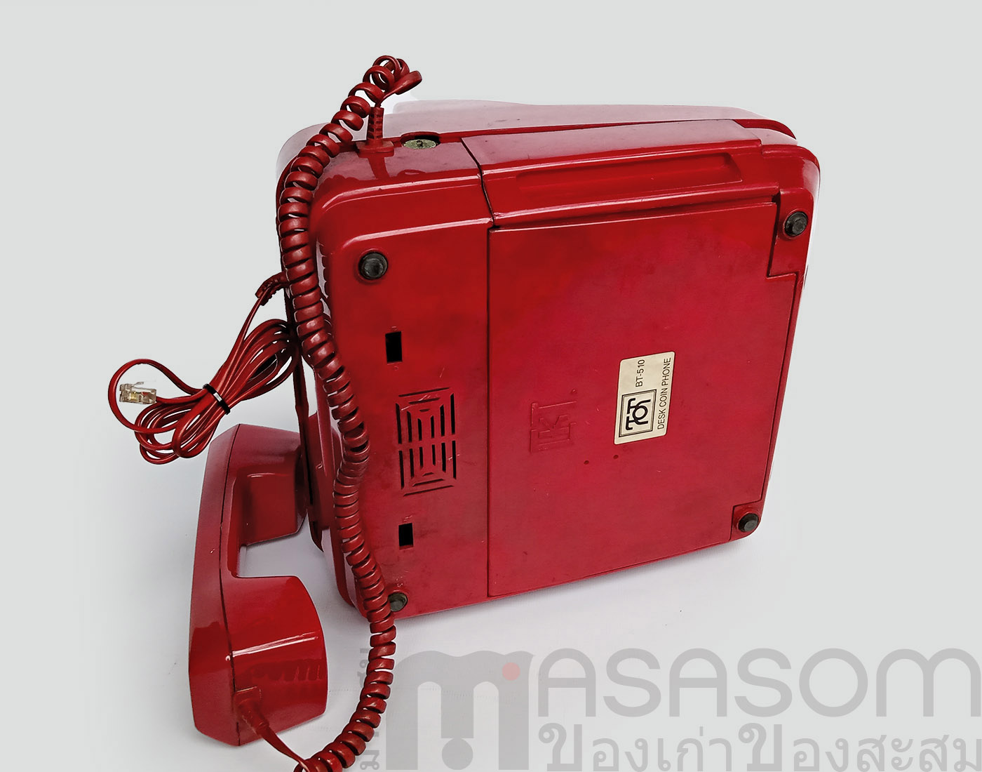 โทรศัพท์เก่าหยอดเหรียญสีแดง