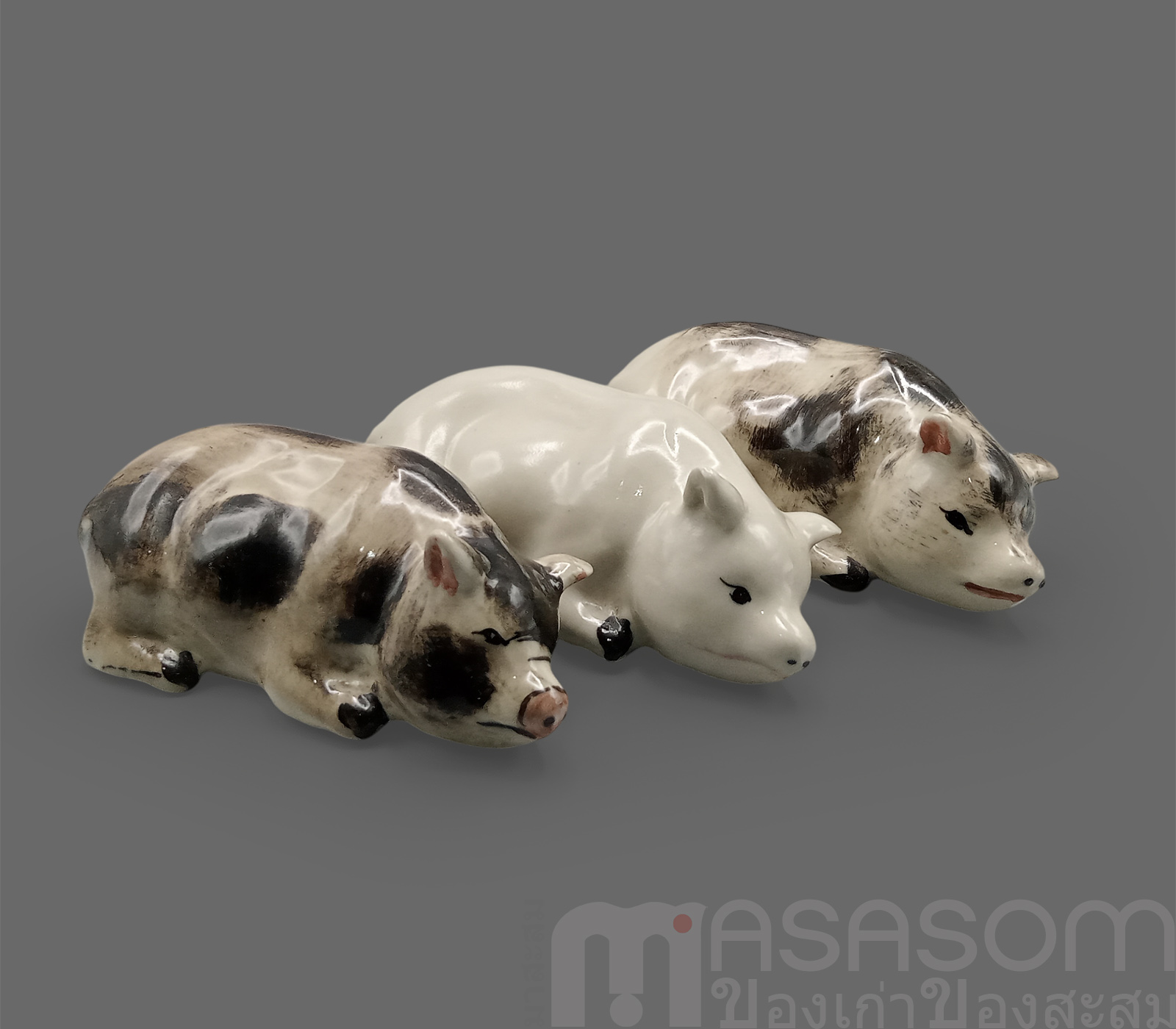 ตุ๊กตารูปหมูนอนเซรามิค