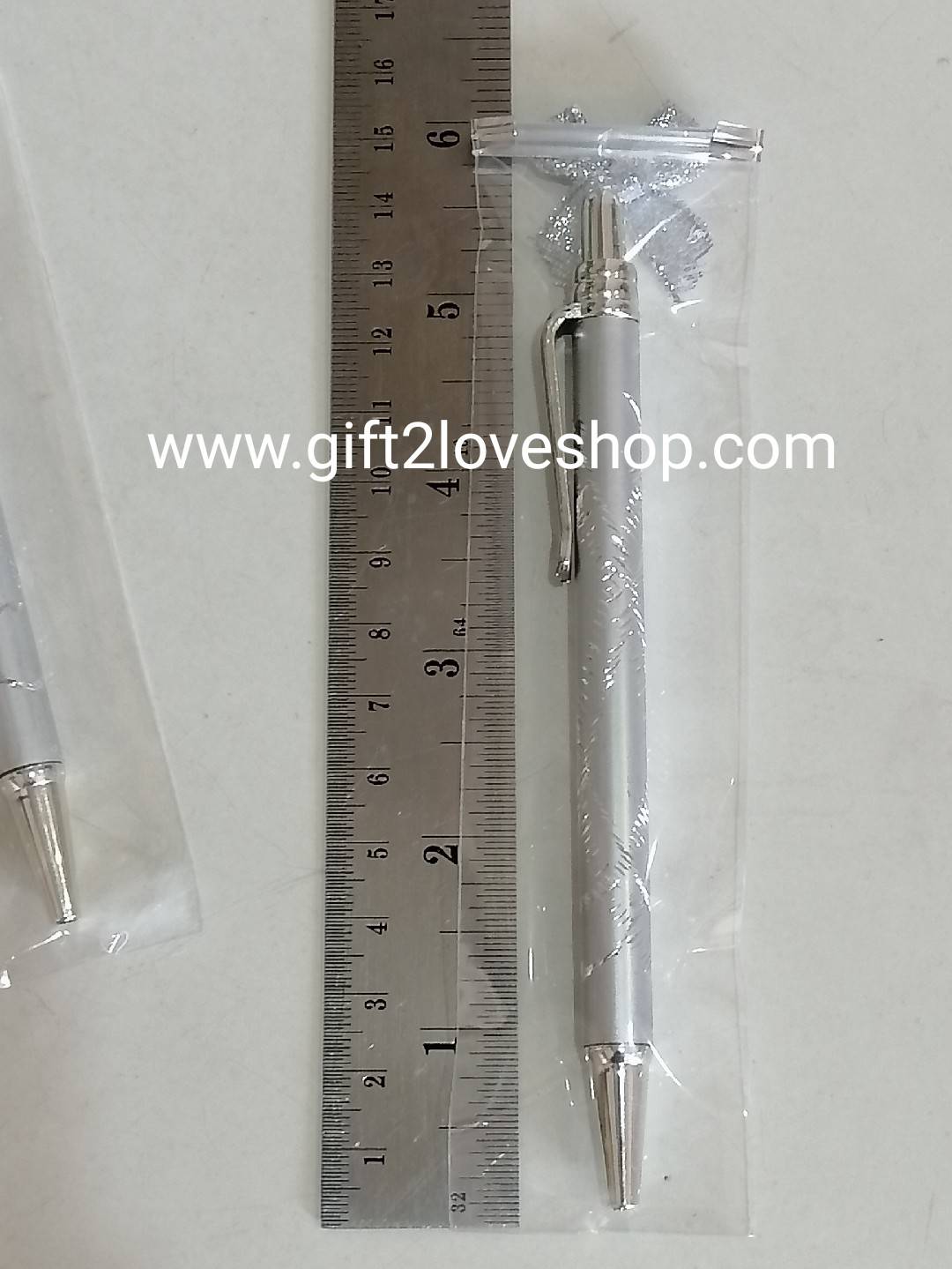 ปากกาสีเงิน ฟรีป้ายชื่อ