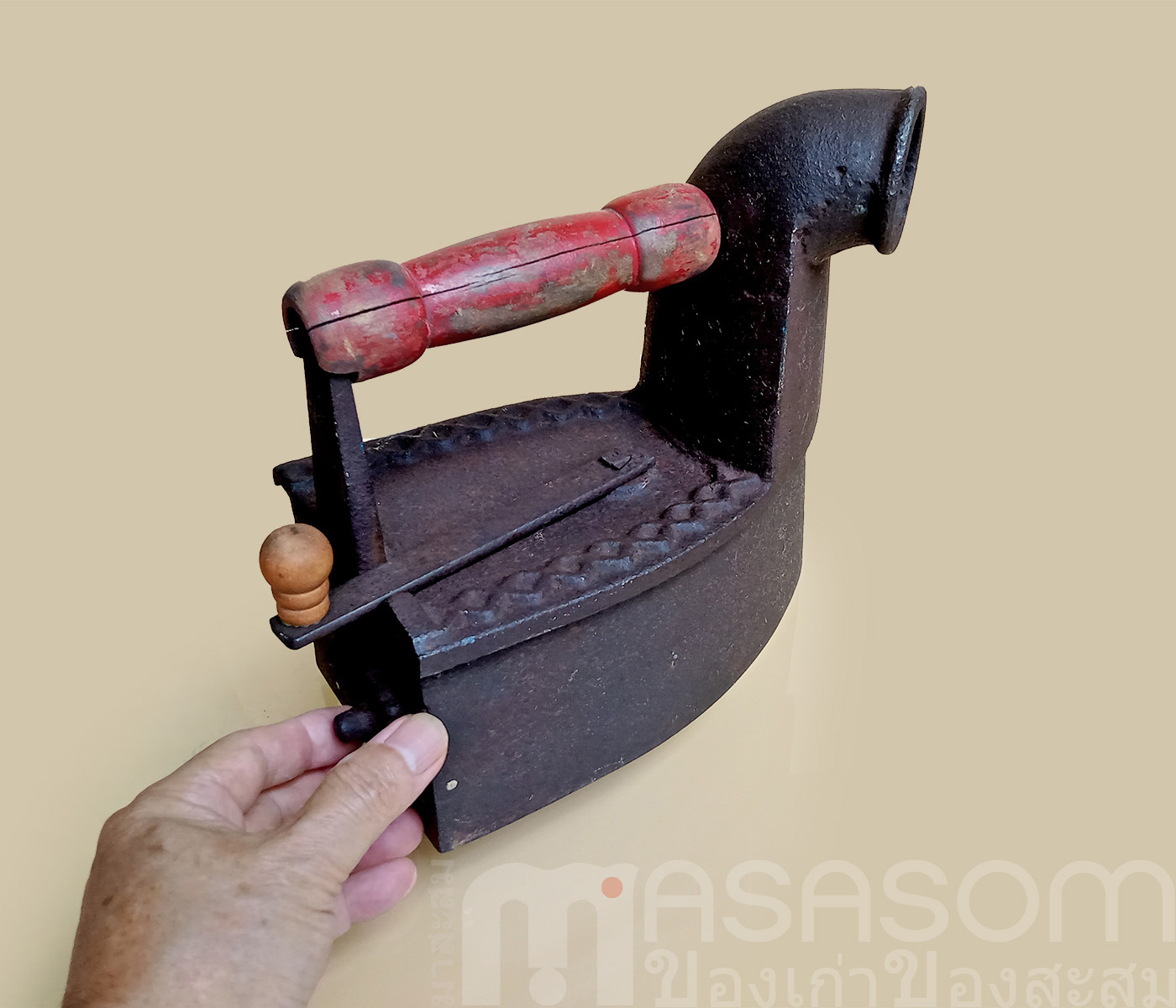 เตารีดงวงช้างโบราณ