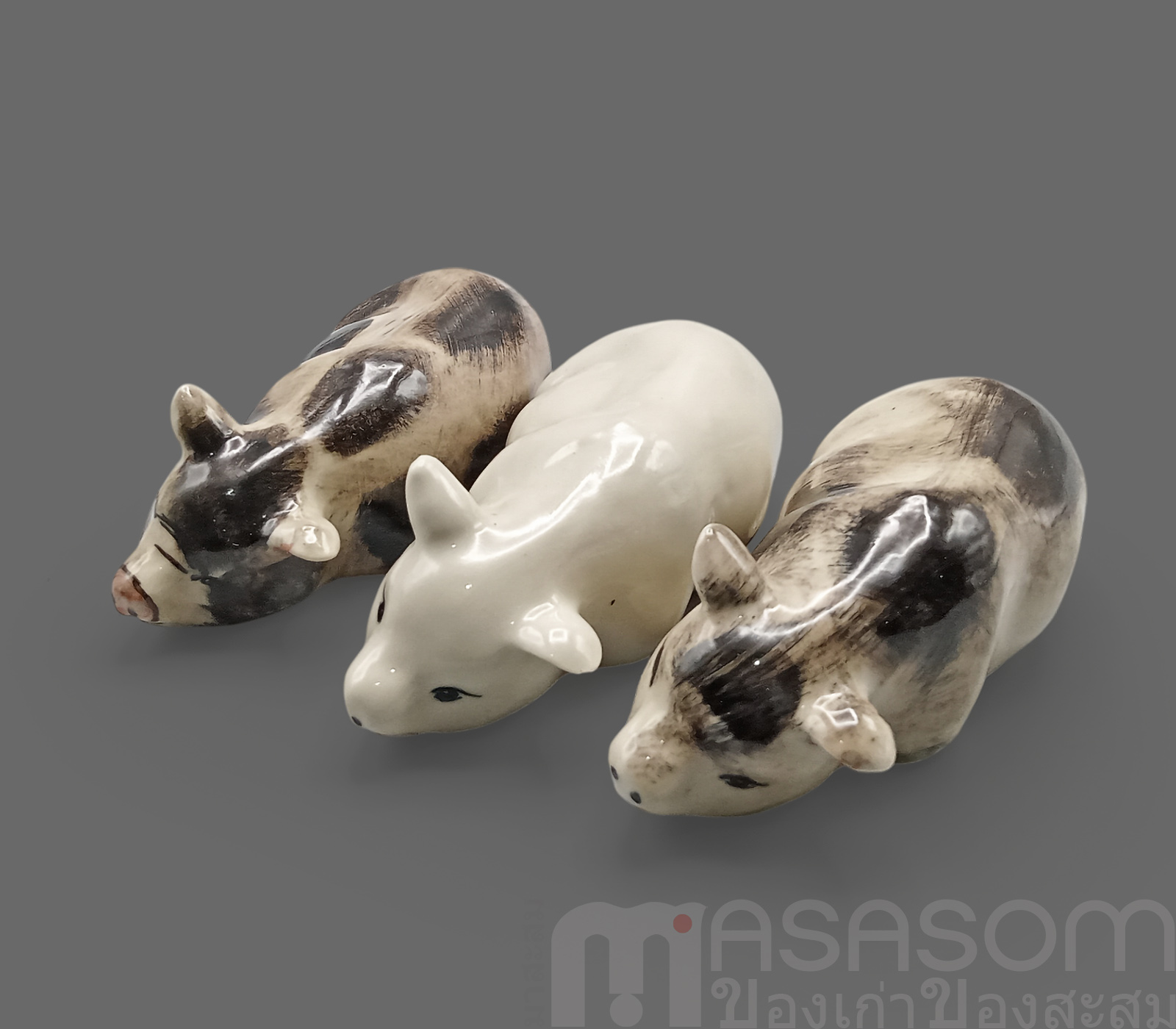 ตุ๊กตารูปหมูนอนเซรามิค